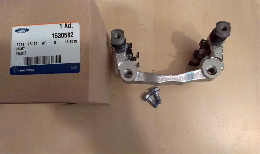 1530582 Ford Jarzmo zacisku hamulcowego tylnego