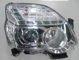 26010JG40A Nissan/Infiniti Reflektor prawy