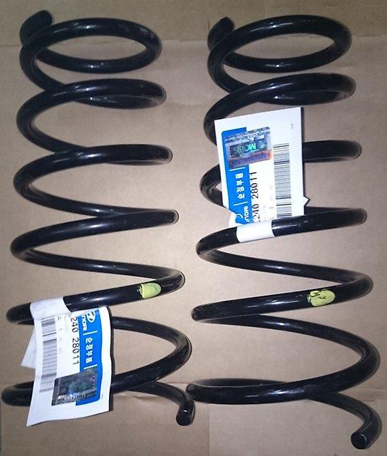 20380XA03A Subaru Sprężyna tylna lewa