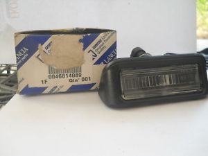 46814089 Fiat/Alfa/Lancia Lampa oświetlenia tylnej tablicy rejestracyjnej