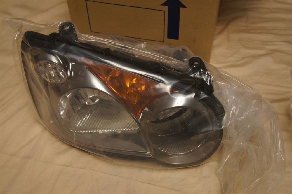 Reflektor prawy Subaru Impreza 2 GD, GG