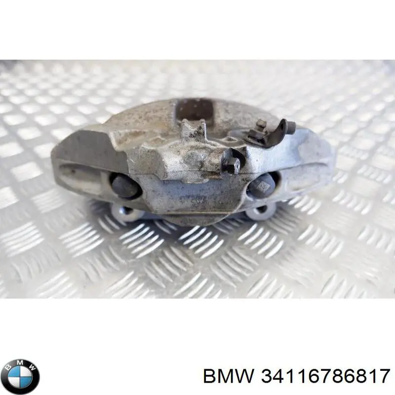 Do koszyka 34116786817 BMW Zacisk hamulcowy przedni lewy