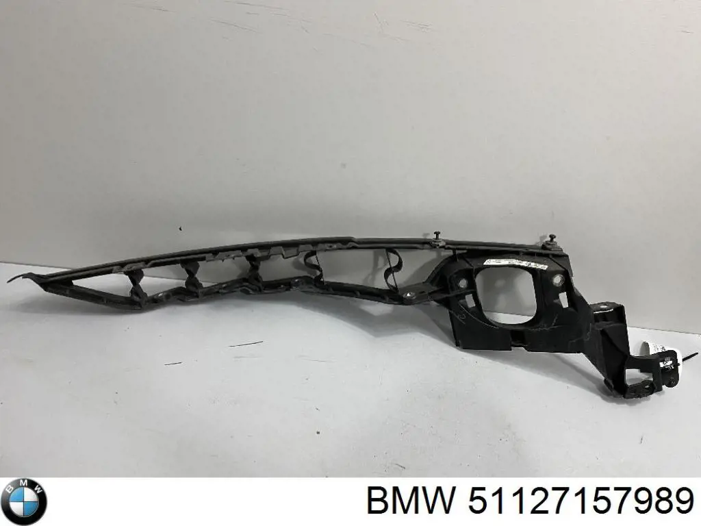 Wspornik górny do mocowania błotnika przedniego lewego BMW 51127157989 cena, od 81,37 USD