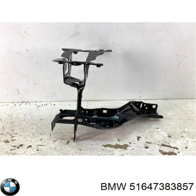Do koszyka 51647383857 BMW Wsponik (adapter) mocowania reflektora przedniego lewego