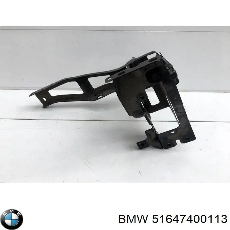 Do koszyka 51647400113 BMW Wsponik (adapter) mocowania reflektora przedniego lewego
