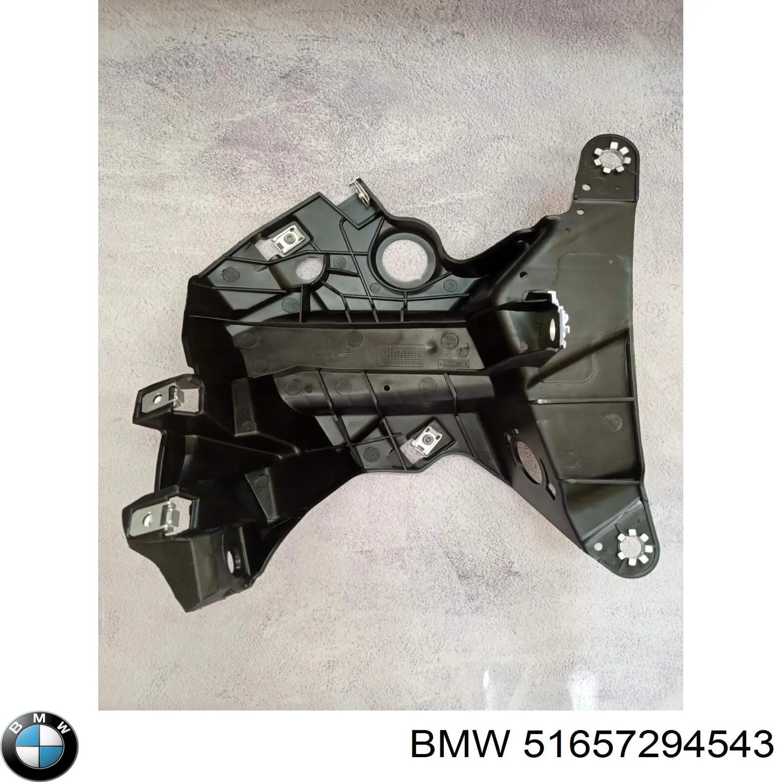 Wspornik do mocowania błotnika przedniego lewy przedni 51657294543 BMW