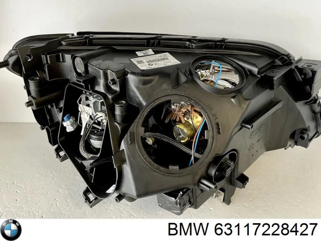 63117228427 BMW Reflektor lewy