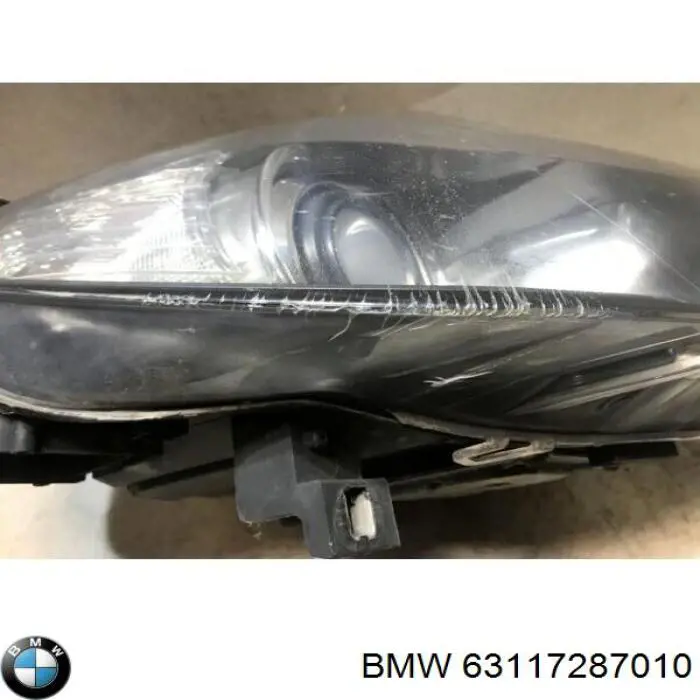 Do koszyka 63117287010 BMW Reflektor prawy