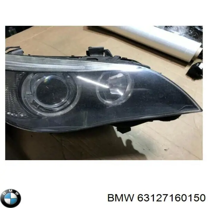 63127160150 BMW Reflektor prawy