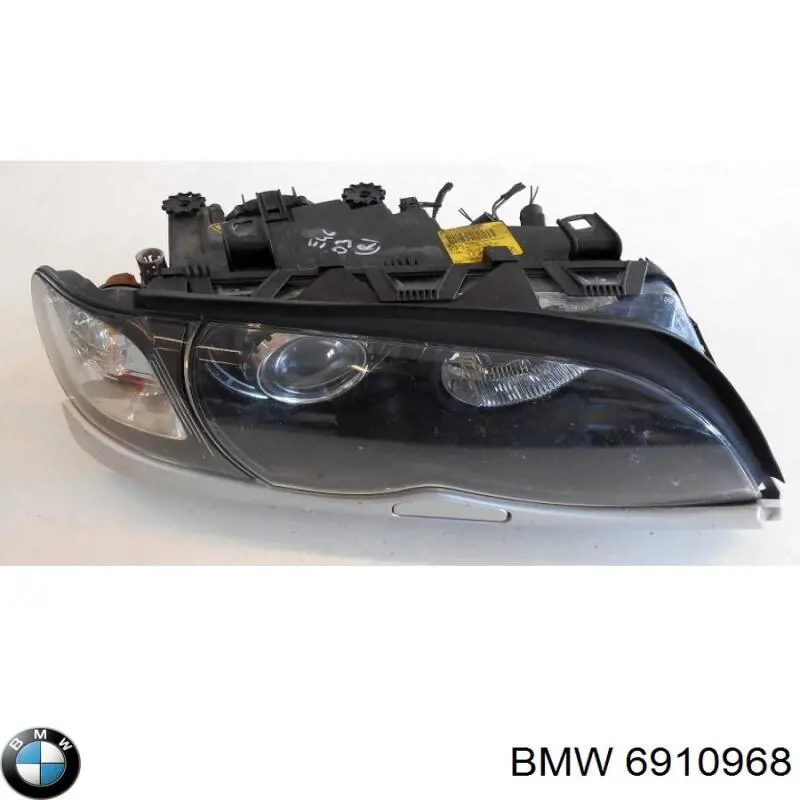 6910968 BMW reflektor prawy