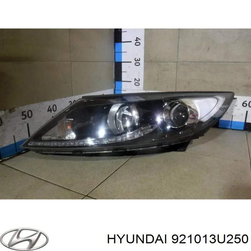 Do koszyka 921013U250 Hyundai/Kia Reflektor lewy