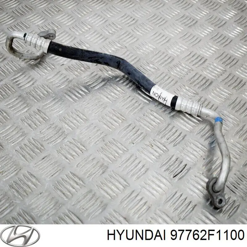 97762F1100 Hyundai/Kia Przewód klimatyzacji, od sprężarki do chłodnicy