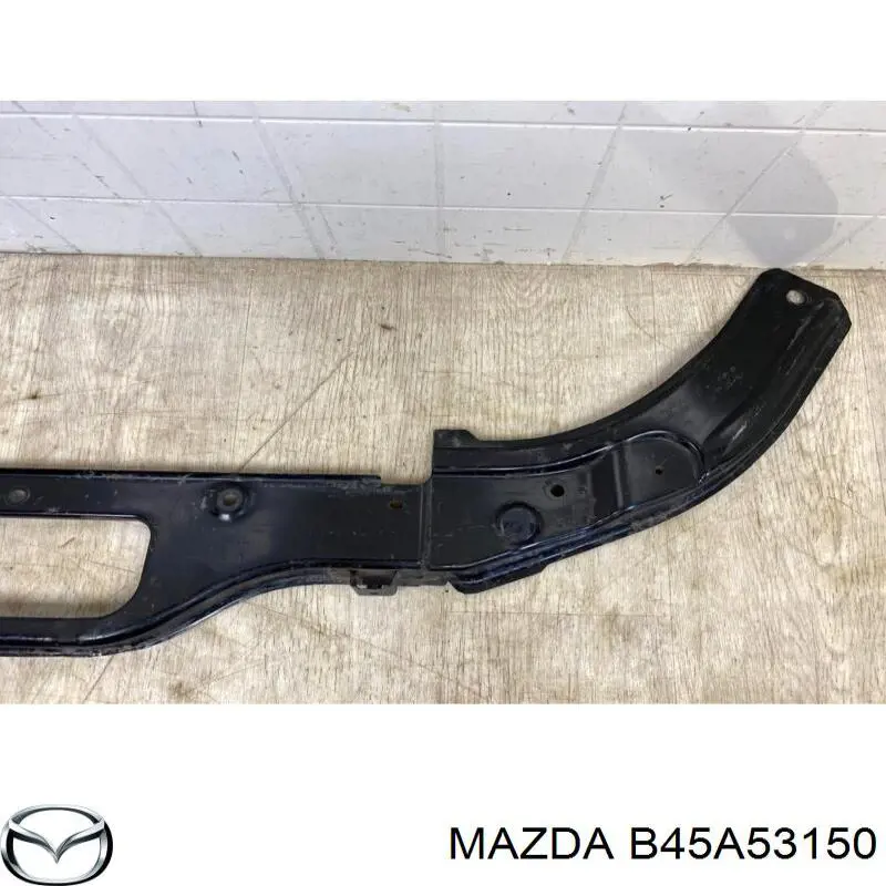 Osłona chłodnicy górna (panel mocowania reflektorów) Mazda B45A53150 cena, od 39,11 USD