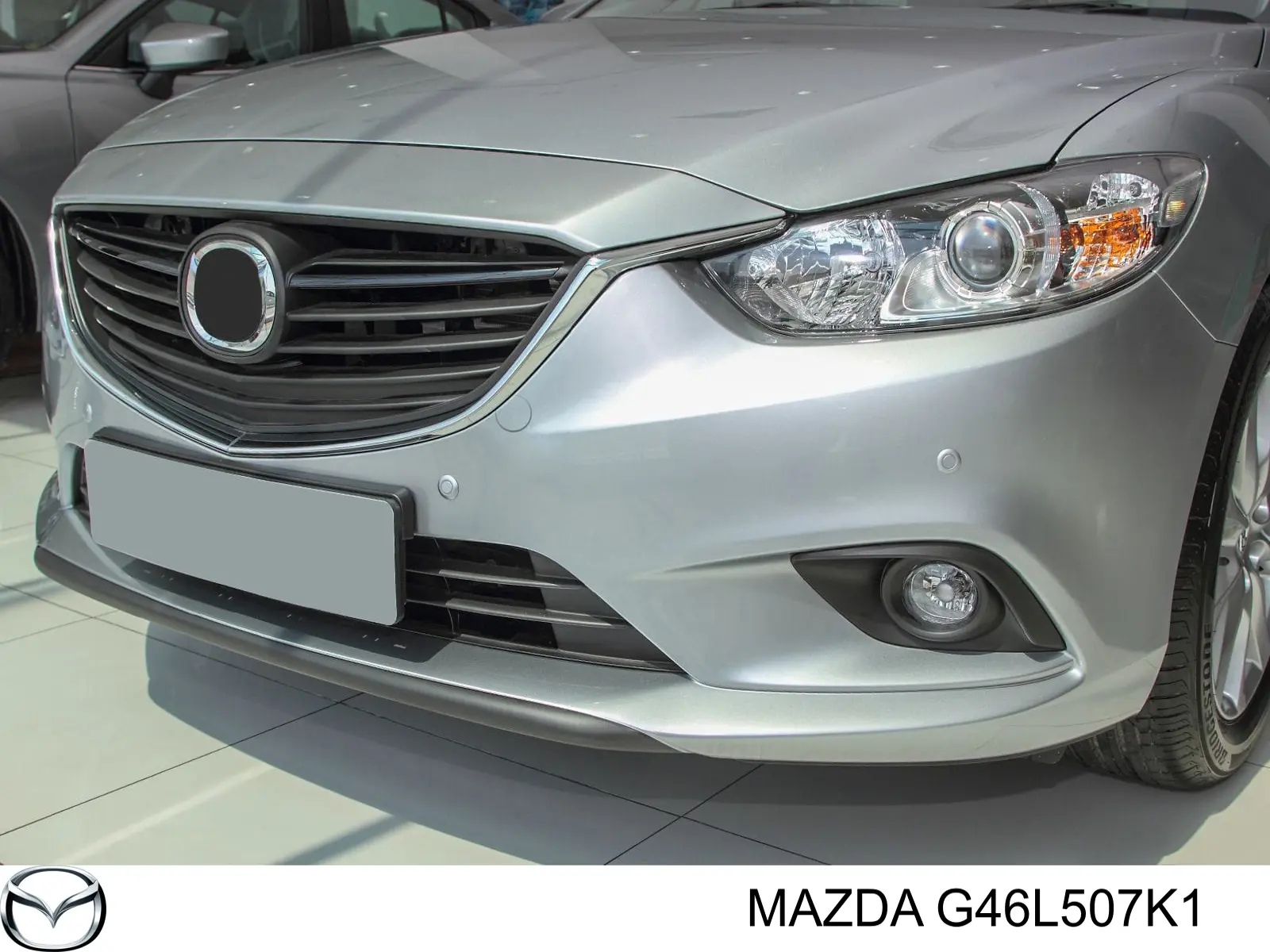 Listwa ochronna atrapy chłodnicy lewa Mazda G46L507K1
