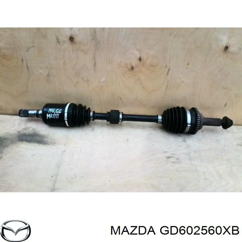 Do koszyka GD602560XB Mazda Półoś napędowa przednia lewa