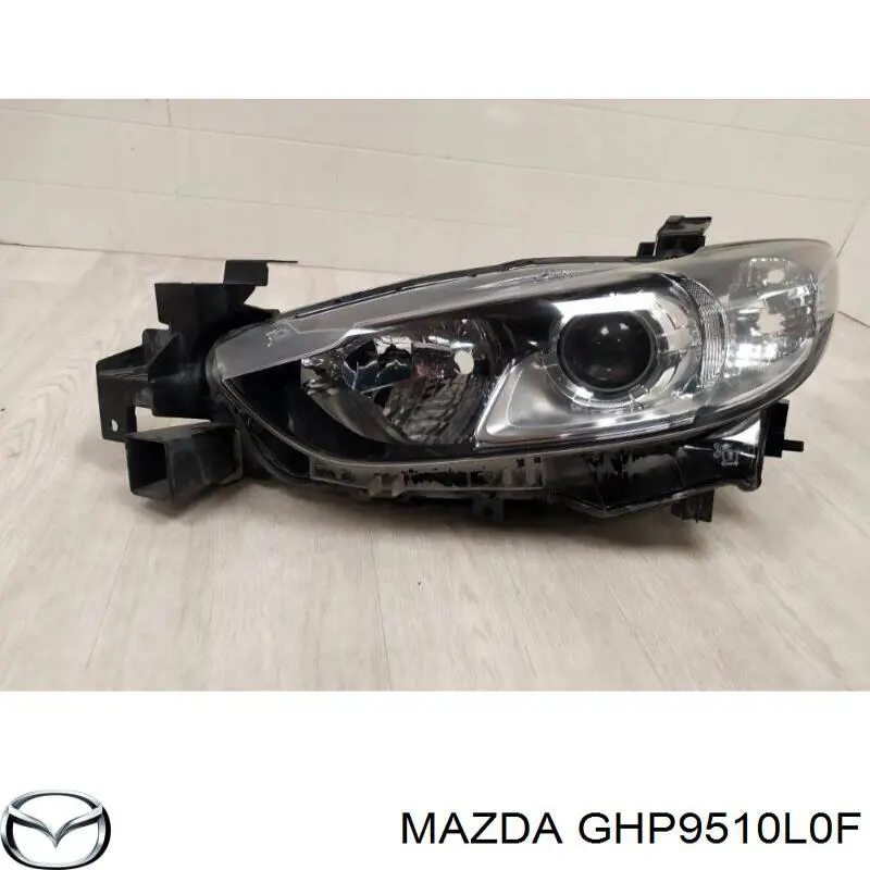 GHP9510L0F Mazda Reflektor lewy