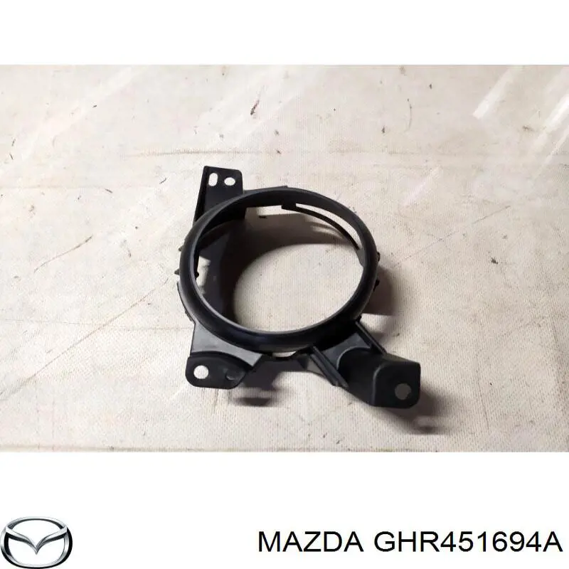 Wspornik mocowania lampy przeciwmgielnej lewej Mazda 6 (GJ, GL)