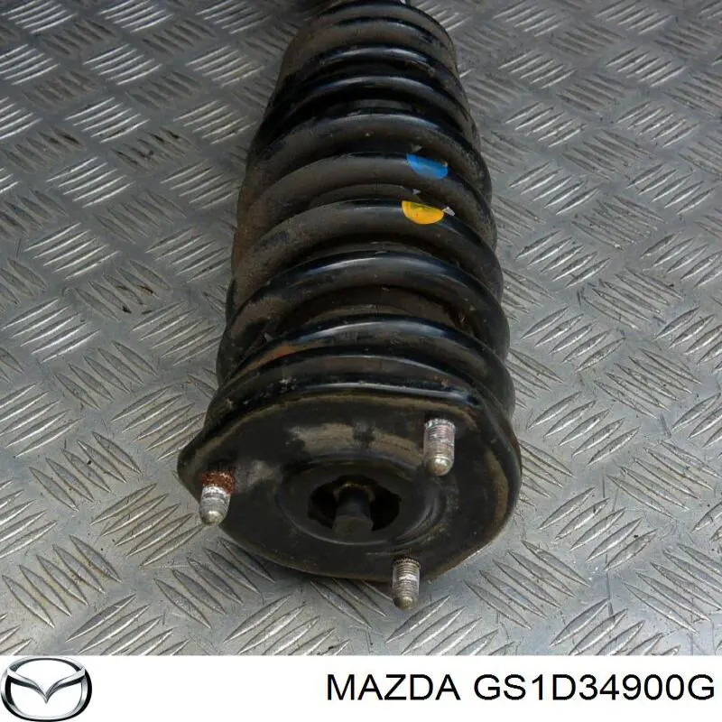 Do koszyka GS1D34900G Mazda Amortyzator przedni lewy