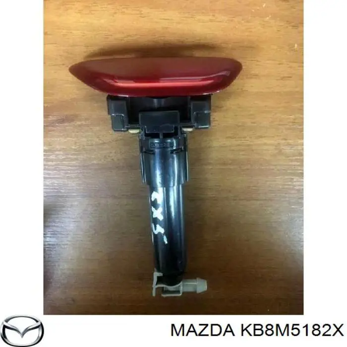 KB8M5182X Mazda Dysza spryskiwacza reflektora przedniego prawego