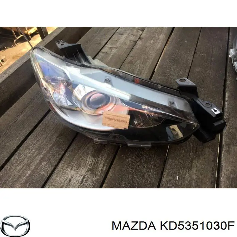Do koszyka KD5351030F Mazda Reflektor prawy