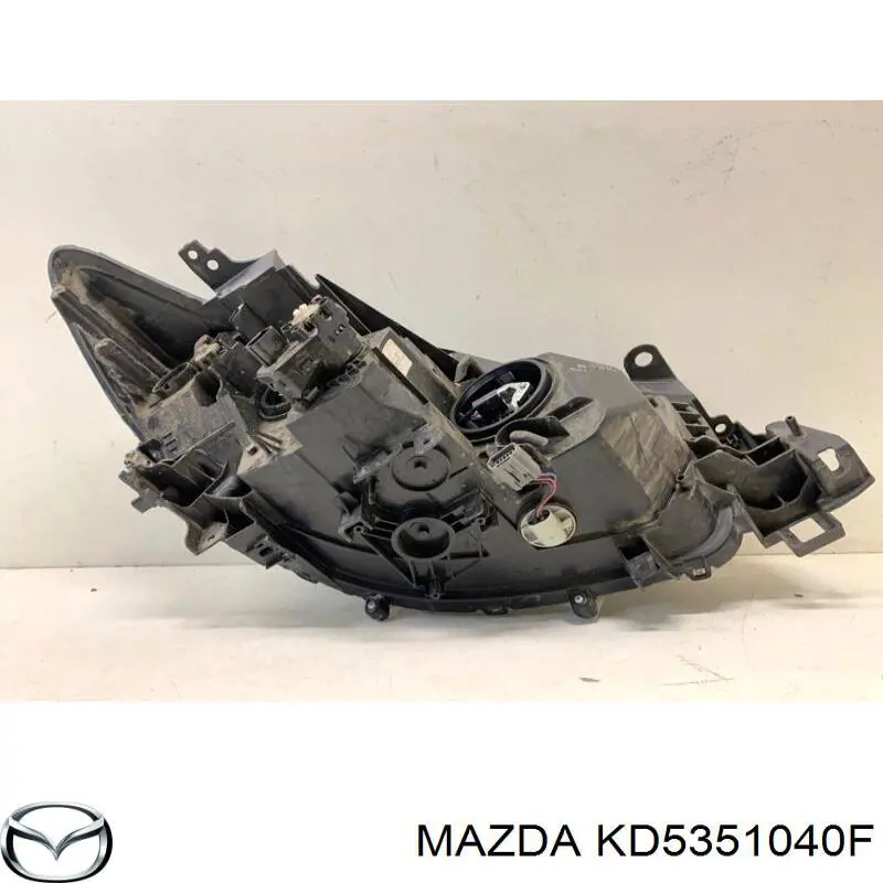 Do koszyka KD5351040F Mazda Reflektor lewy