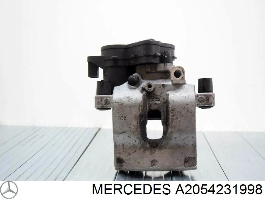 A2054231998 Mercedes Zacisk hamulcowy tylny lewy