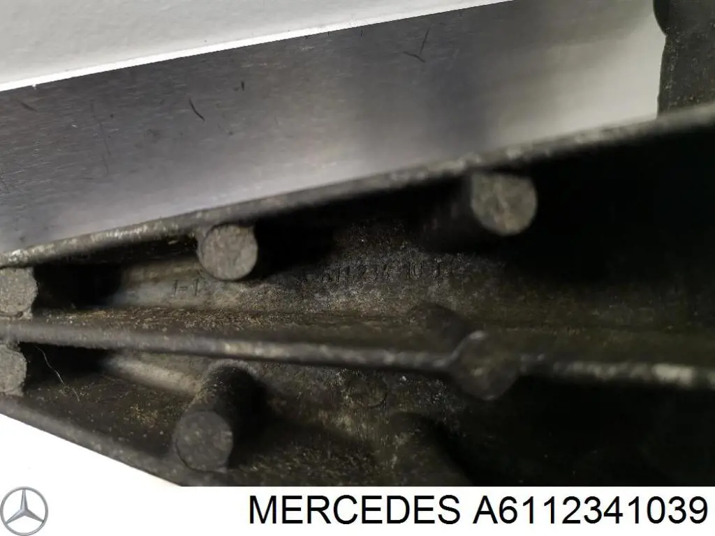 A6112341039 Mercedes Wspornik rolki kierunkowej paska napędowego