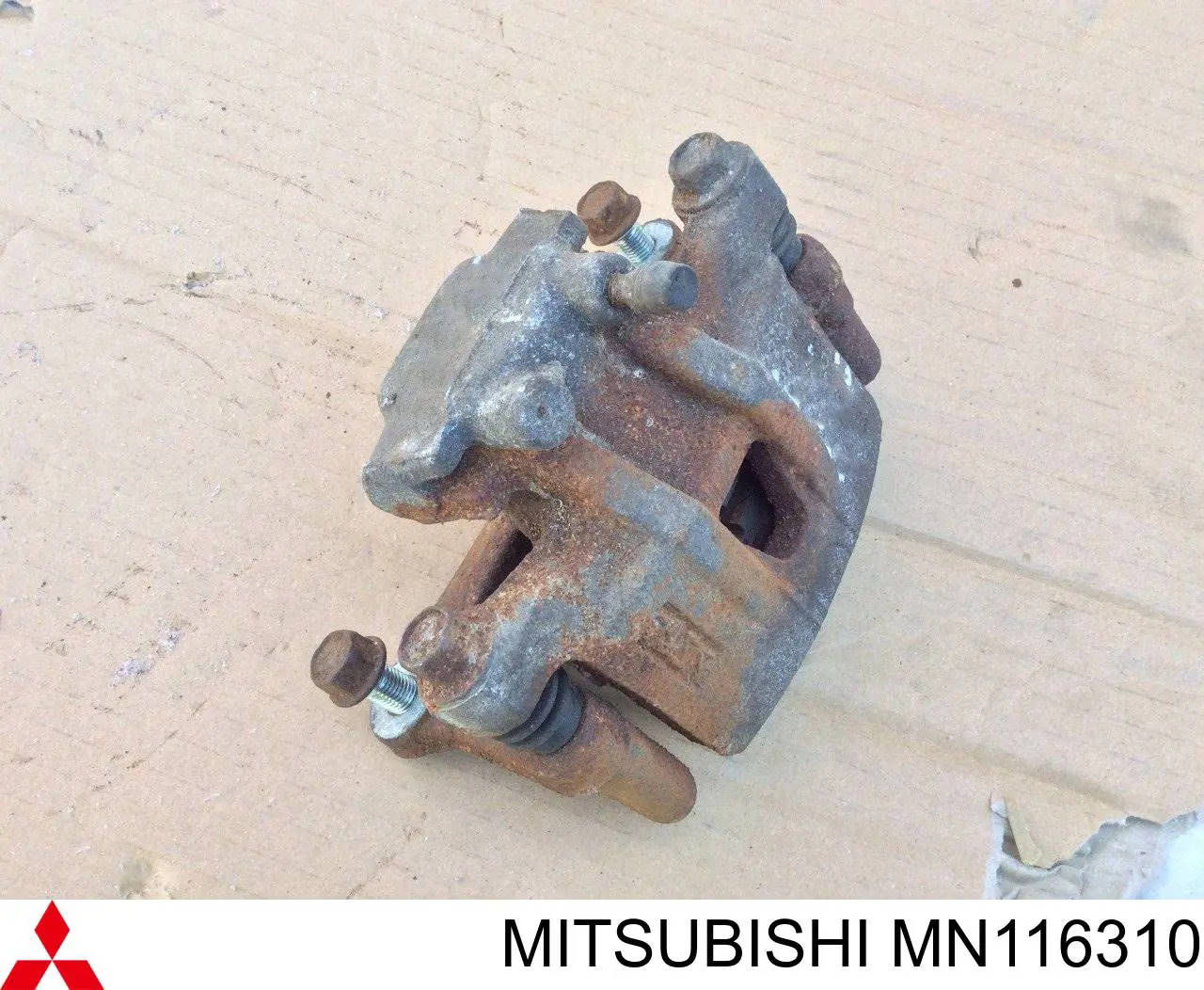 Do koszyka MN116310 Mitsubishi Zacisk hamulcowy tylny prawy