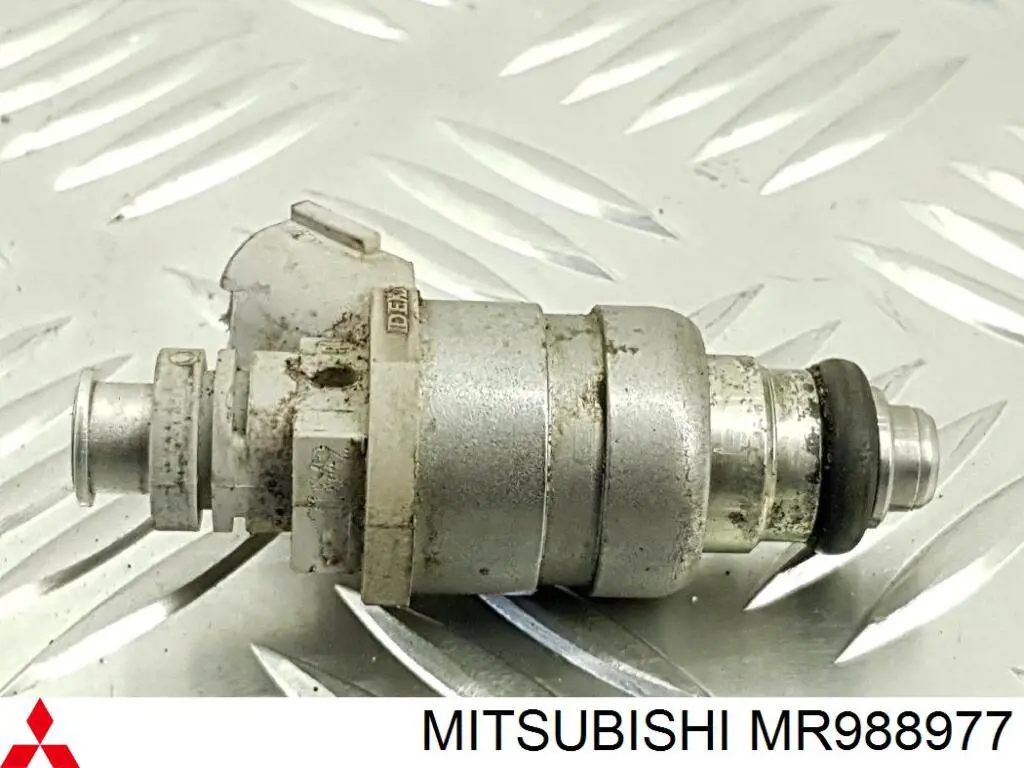 Do koszyka MR988977 Mitsubishi Wtryskiwacz paliwa