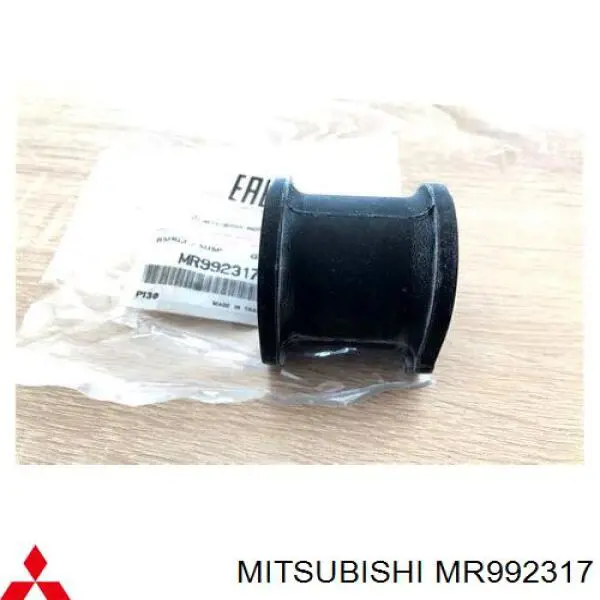 Do koszyka MR992317 Mitsubishi Tuleja stabilizatora przedniego