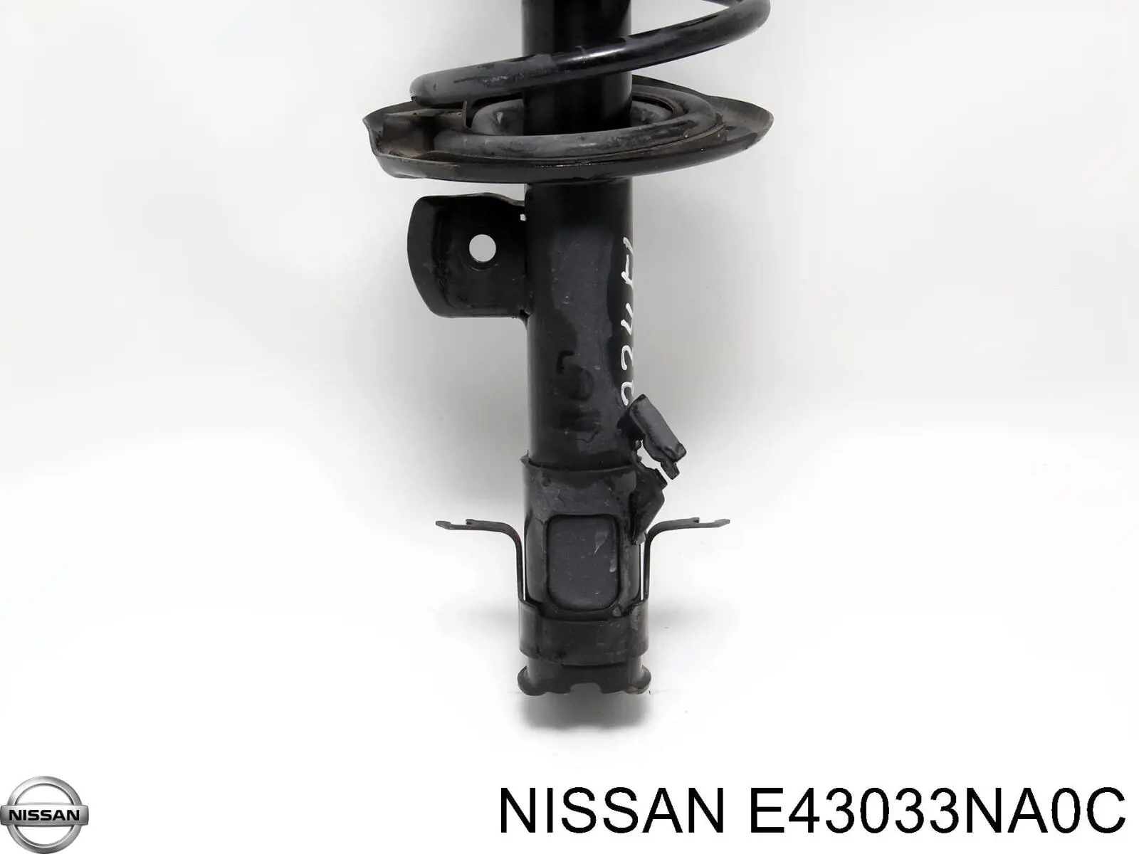 E43033NA0C Nissan amortyzator przedni lewy