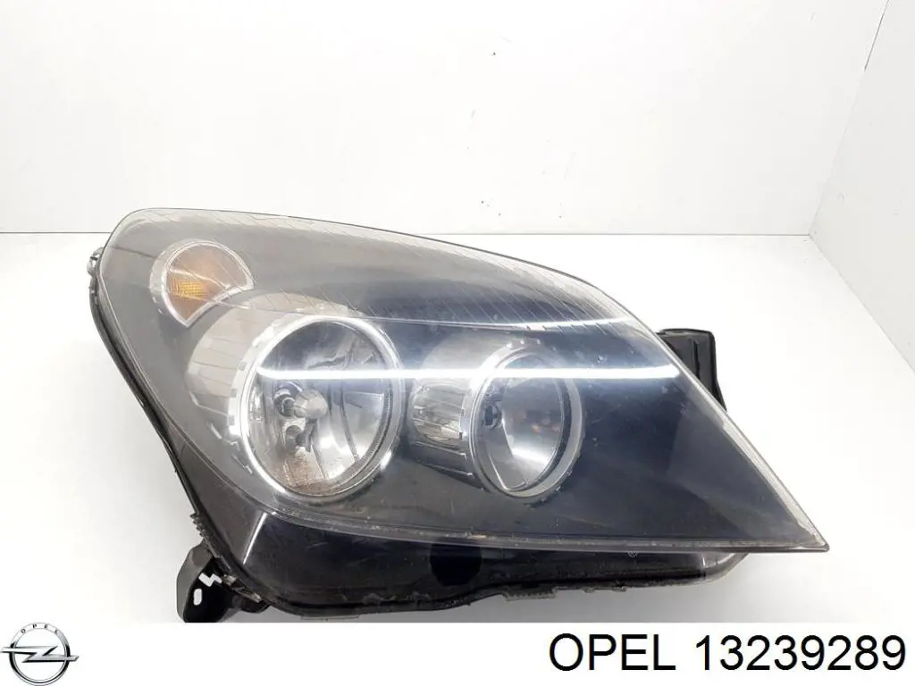 13239289 Opel Reflektor prawy