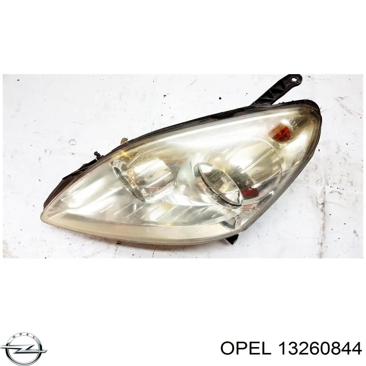 Reflektor lewy 13260844 Opel