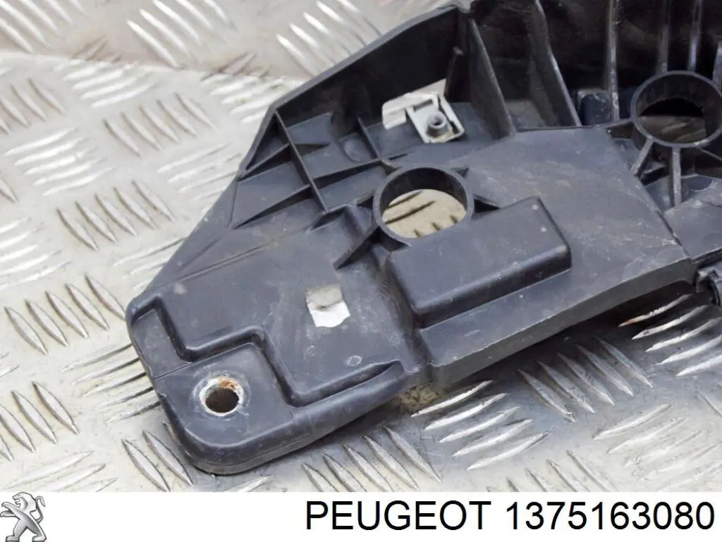 Do koszyka 1626195780 Peugeot/Citroen Wspornik zderzaka przedniego lewy