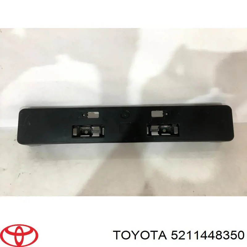 Ramka do mocowania przedniej tablicy rejestracyjnej Toyota 5211448350 cena, od 19,31 USD