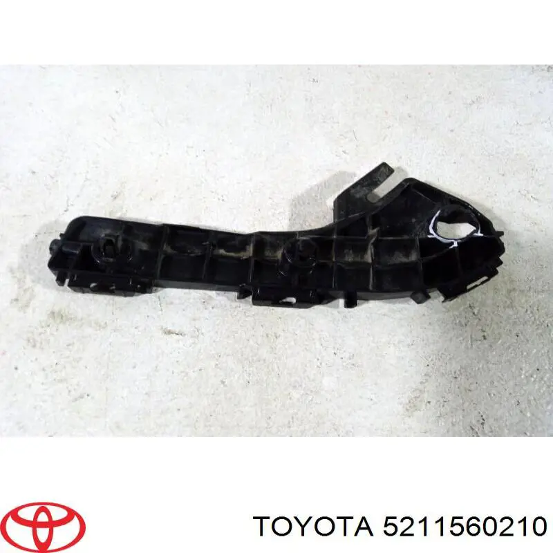 5211560210 Toyota Wspornik zderzaka przedniego prawy zewnętrzny