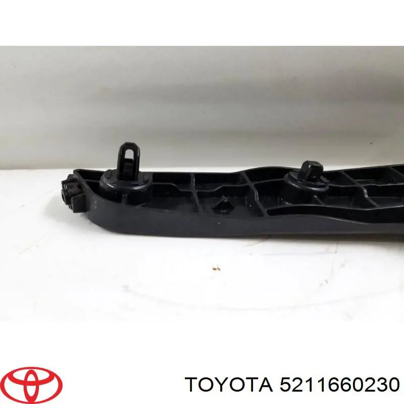 5211660230 Toyota Wspornik zderzaka przedniego lewy zewnętrzny