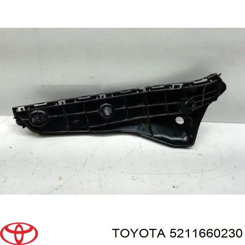 Wspornik zderzaka przedniego lewy zewnętrzny Toyota 5211660230