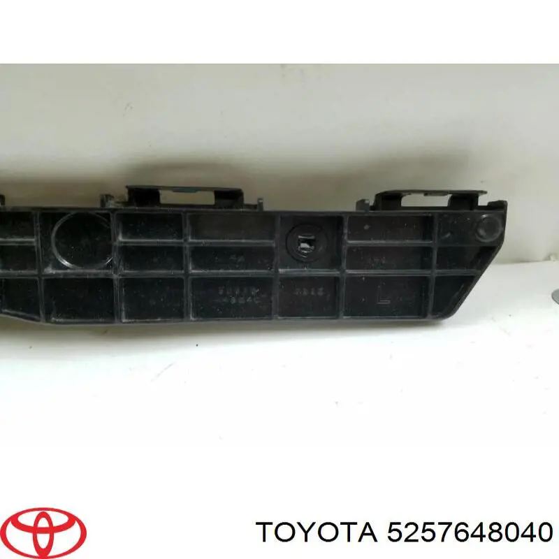 5257648040 Toyota Wspornik zderzaka tylnego lewy zewnętrzny