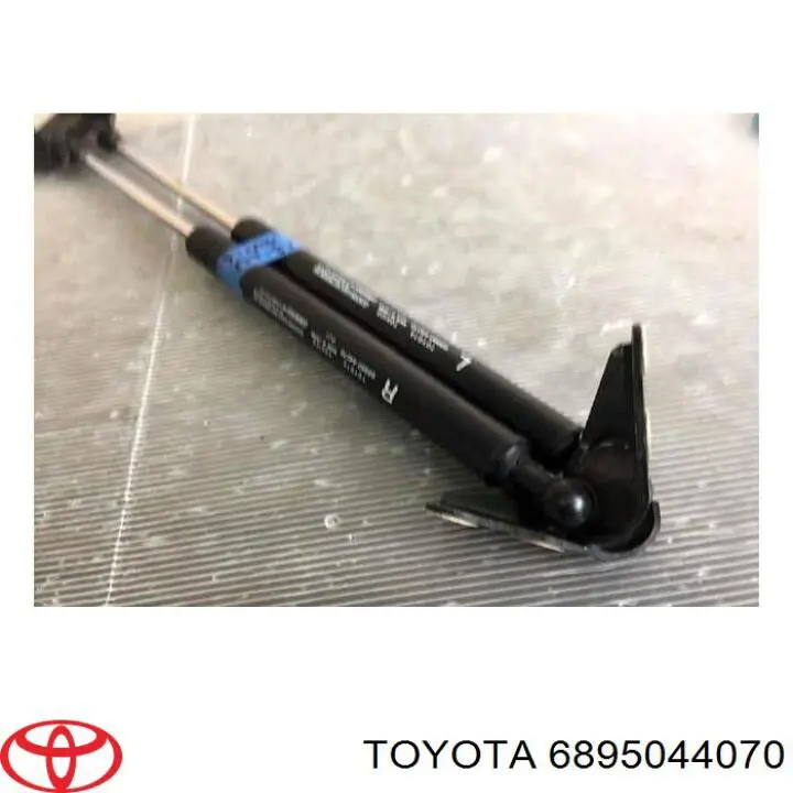 Do koszyka 6895044070 Toyota Amortyzator klapy bagażnika (3/5 drzwi-tylnych)