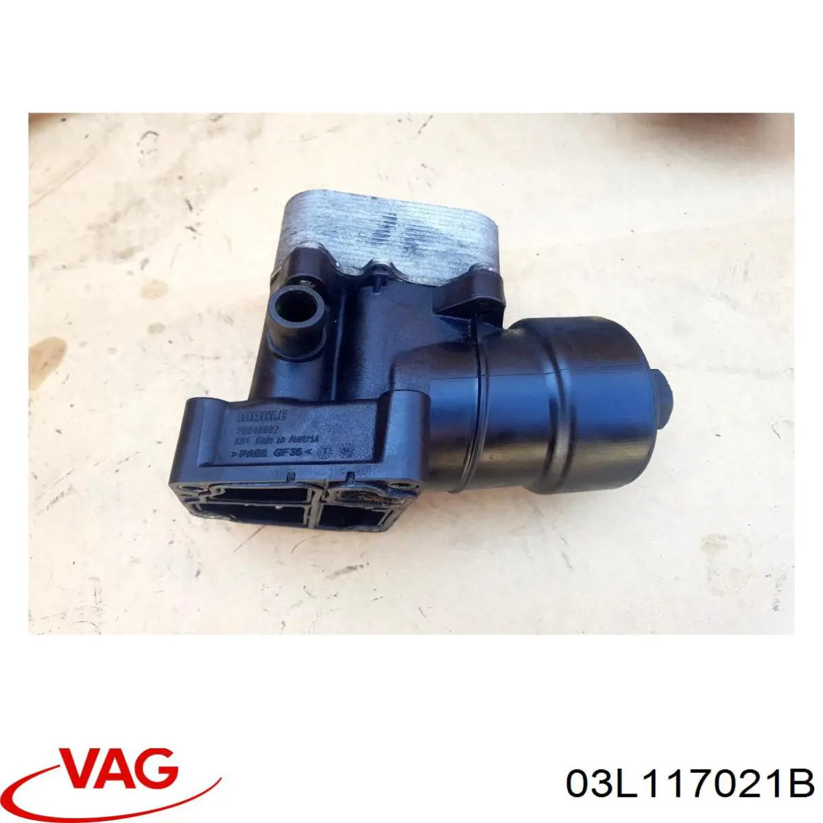 Chłodnica oleju, pod filtrem VAG 03L117021B cena, od 38,99 USD