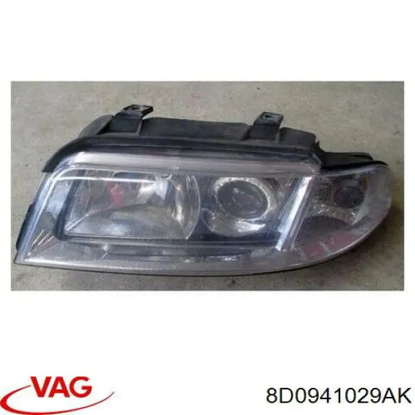 Do koszyka 8D0941029AK VAG Reflektor lewy