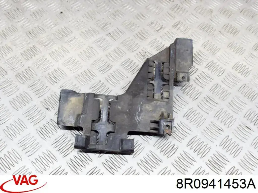 Wsponik (adapter) mocowania reflektora przedniego lewego AND 30941147 cena, od 20,95 USD