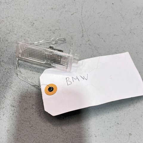 Lampa podświetlania w drzwiach 6961999 BMW
