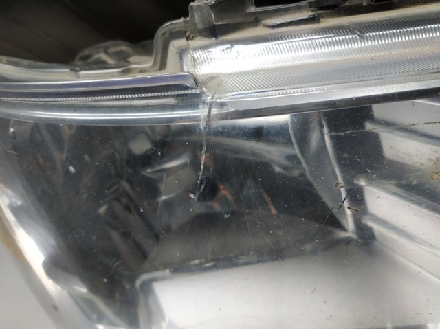 Reflektor prawy 05067788AC CHRYSLER