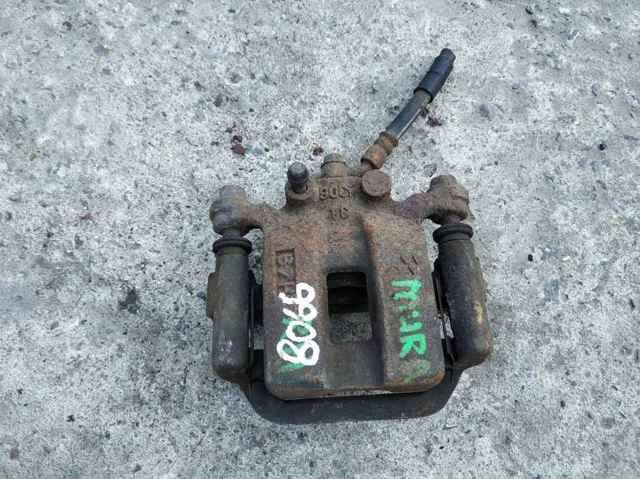 Zacisk hamulcowy tylny prawy 44001AL500 NISSAN