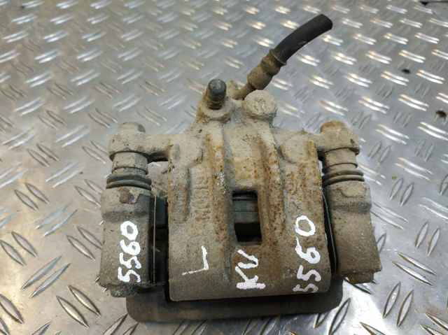 Zacisk hamulcowy tylny lewy 582103S200 HYUNDAI