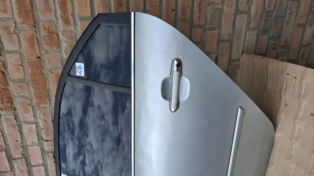 Drzwi tylne lewe 770033K010 HYUNDAI