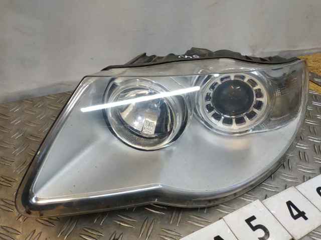 Reflektor lewy 7L6941039 VAG