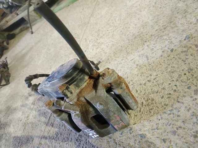 Zacisk hamulcowy tylny lewy Mazda CX-9 TC